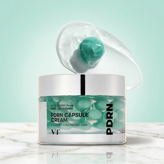 Pot PDRN Capsule Cream sur marbre — capsules réelles et texture du gel